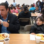 BrazeauStinkEye Patrick Brazeau gets a look from a small girl at Chili for Children Lunch